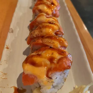 5324 roll - tempura salmon, snow crab mix, avocado; topped with seared salmon, miso mayo, spicy mayo, unagi sauce