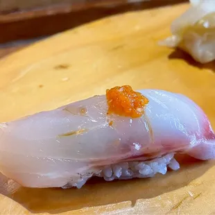 a close up of a piece of sushi