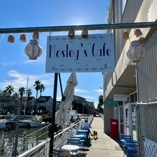 a sign for mosley's cafe