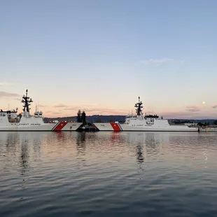 two coast guard boats in the water