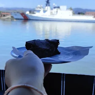 Eating a german brownie with view of the marina.