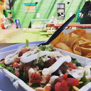 a plate of food and chips