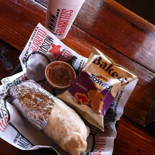 a cup of coffee and a bag of chips