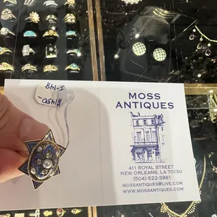 Ring I got my wife.  14k gold  Diamonds, pearl. Over 100 Years old.