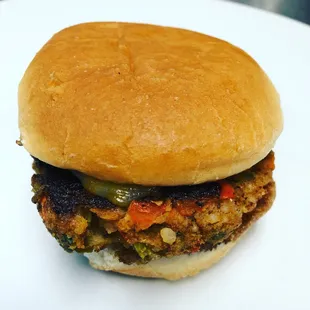 a burger on a white plate