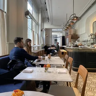 Customers enjoying breakfast at Mostrador NYC