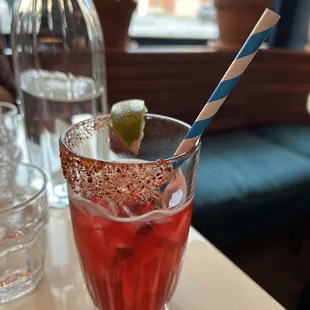 a drink in a glass with a straw