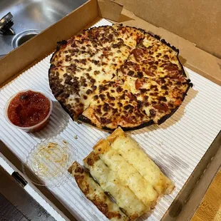 Half Pepperoni/Half Sausage with cheese bread and the best marinara sauce I've ever had