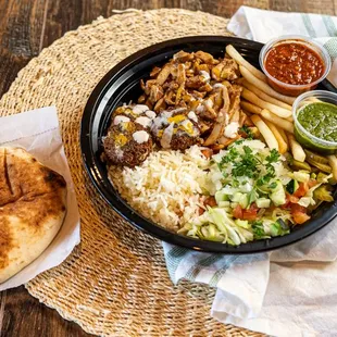 The mother f. plate. Enjoy shawarma, falafel and fries (and any salads of course) in the same plate. one of our best seller plates.