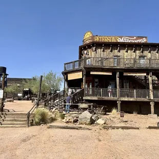 two motorcycles parked in front of a building