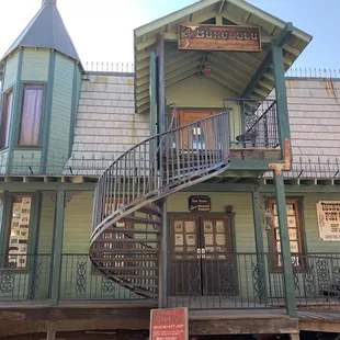 a spiral staircase in front of a building