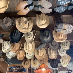 This was in the saloon!! Hats and boots hanging from the ceiling.