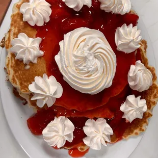 Here we have an order of 3 Pancakes topped with Strawberries and Whipped Cream to make breakfast even better.
