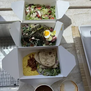 Vegan chili, tumeric hummus, kale salad, farro strawberry salad