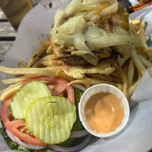 Hamburger with cheddar cheese and caramelized onions