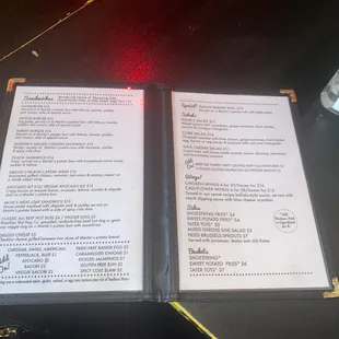 a menu and a bottle of water