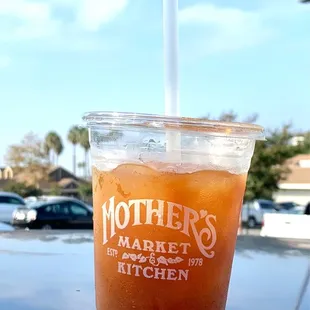 Iced Americano with splash of oatmilk.