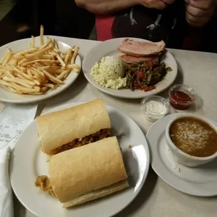 Ham plate, comes with 3 sides. Also in pic is poboy plus cup of Maes gumbo.