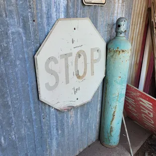 a stop sign and a propanent