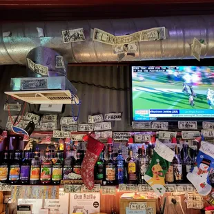 a man playing a football game on a tv