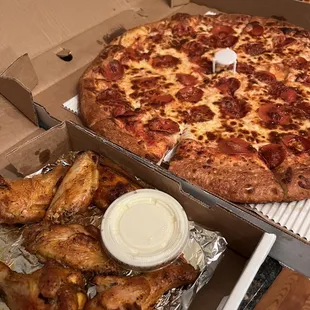 a pizza and chicken wings