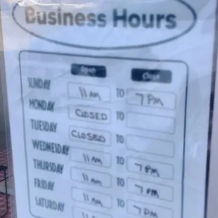 a business hours sign