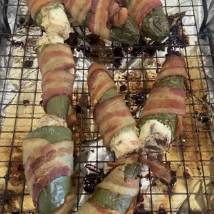 Jalapeño poppers wrapped in bacon and stuffed with a brisket cream cheese mixture