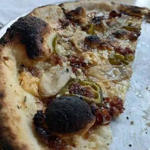 Half a white potato and bacon pizza. Legit one of the best slices I&apos;ve ever had.
