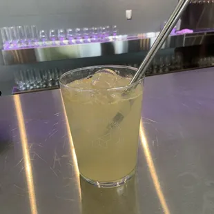 a drink in a glass with a straw