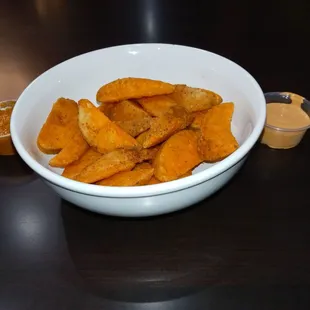 Masala Fries w/ tomato &amp; sesame sauce &amp; tangy sauce.