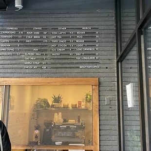 menu on brick wall