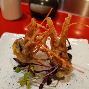 Fried sweet shrimp head with some black salt.