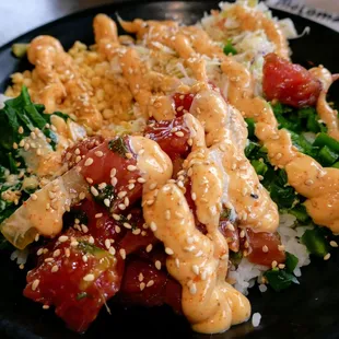 a plate of food with rice and vegetables