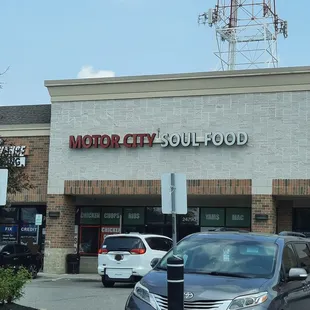 a car parked in front of a building