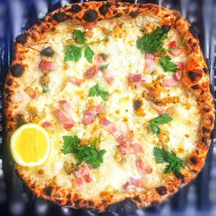 Cherrystone Clam Pizza with Smoked Pancetta and Buffalo Mozzarella.