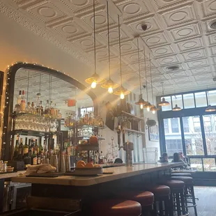 Cute bar, bright and spacious room.