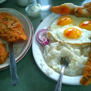 Love  me some Cornmeal breaded Catfish Eggs and Grits outstanding best in Detroit go now.