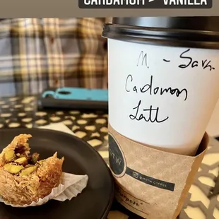 a cup of coffee and a muffin