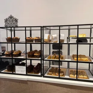 Dessert case: muffins, honeycomb bread, assorted baklava, and more