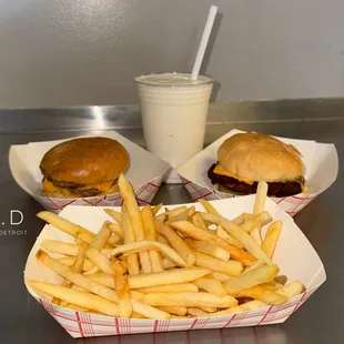 Double Cheeseburger (no onions), Chicken Sandwich with Cheese, French Fries, and a Vanilla Shake