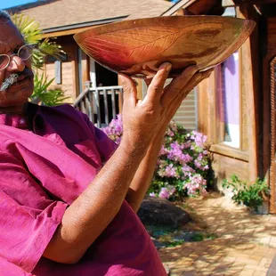 Sooriya with Copper Bowl