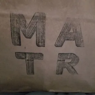 a brown paper bag with the word matter written on it