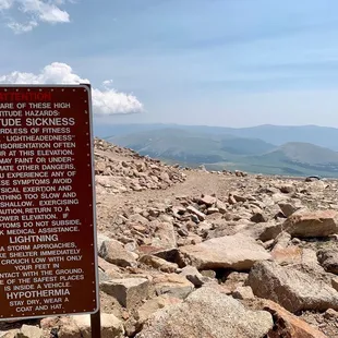 At the summit of Mount Evans over 14,000 feet high, they warn you about altitude sickness.