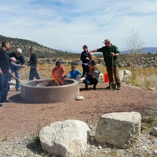 At the Fall Festival, people a Roasting smores.