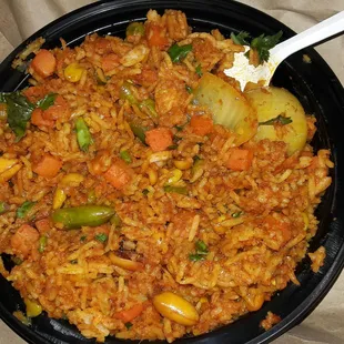 a bowl of rice and vegetables