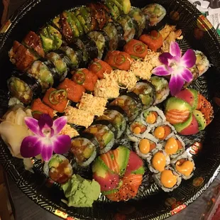 Dragon Roll, Monster Roll,  Allison Roll, crab roll, Monster Roll, Spicy Tuna Roll, two Sushi Donuts