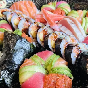 Sushi Donut, Spicy Tuna &amp; Avocado Handroll, Monster Roll and Chef&apos;s Choice Sashimi.