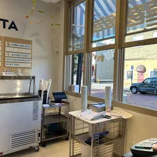 Behind counter looking out front service window.