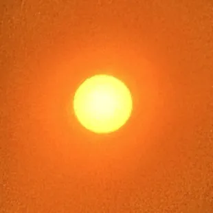 Looking at the sun through a lens