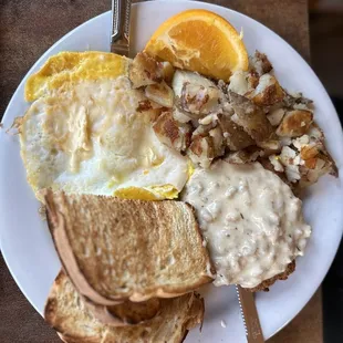 Chicken fried steak with eggs and toast